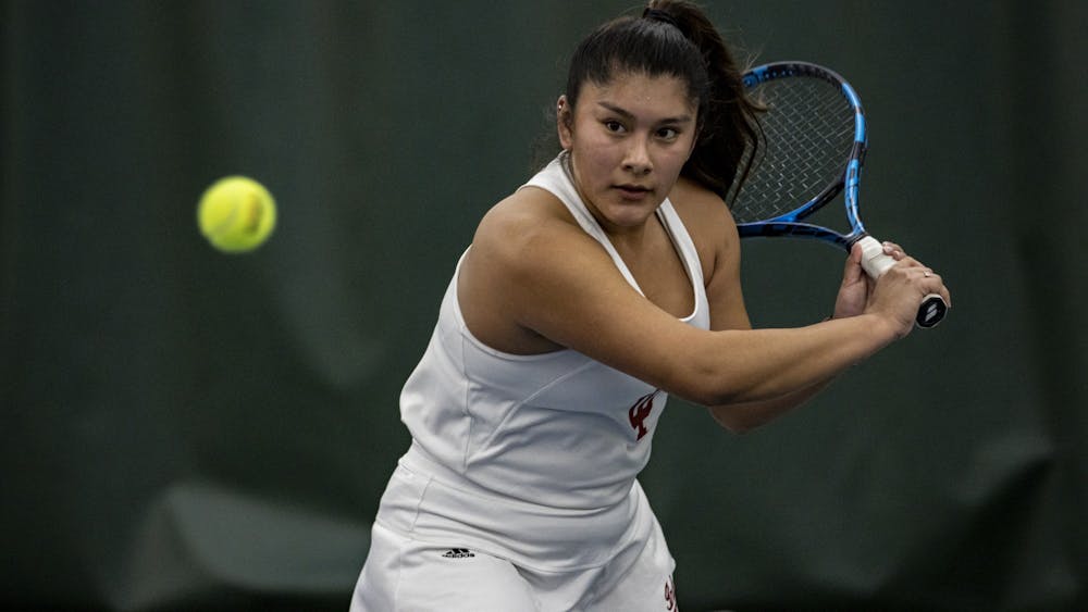 Sophomore Sayda Hernandez prepares to return a serve on Feb. 26, 2022, at the IU Tennis Center. Indiana beat Cornell, but lost to Xavier over the weekend.