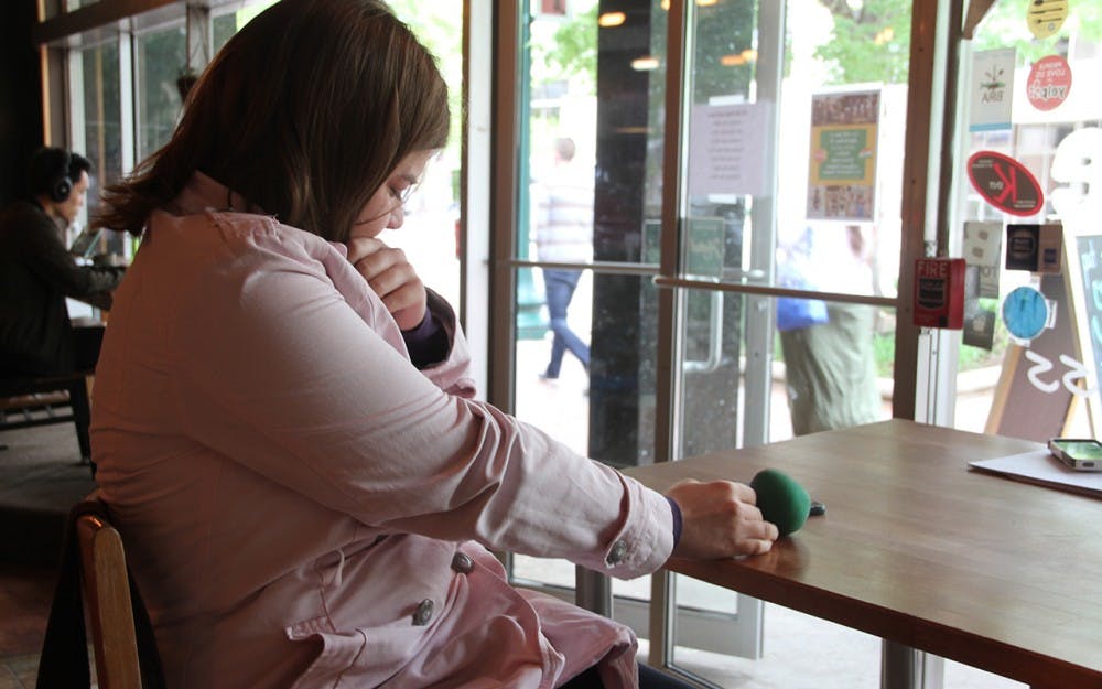 Amanda has been diagnosed with post-traumatic stress disorder, depression and anxiety, which she traces back to her father's abuse. She plays with her green stress ball when she gets anxious.
