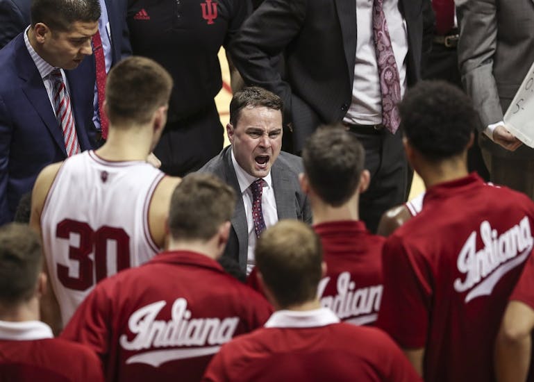 IU Coach Archie Miller yells at the IU basketball team in a huddle during the Hoosiers' game against the Iowa Hawkeyes in Simon Skjodt Assembly Hall on Dec. 4. IU's 2018-19 men's basketball schedule has been finalized, and most games also have television channels and times designated.
