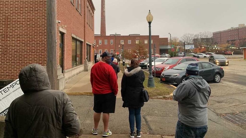 Monroe County residents wait Oct. 26 outside to vote. 