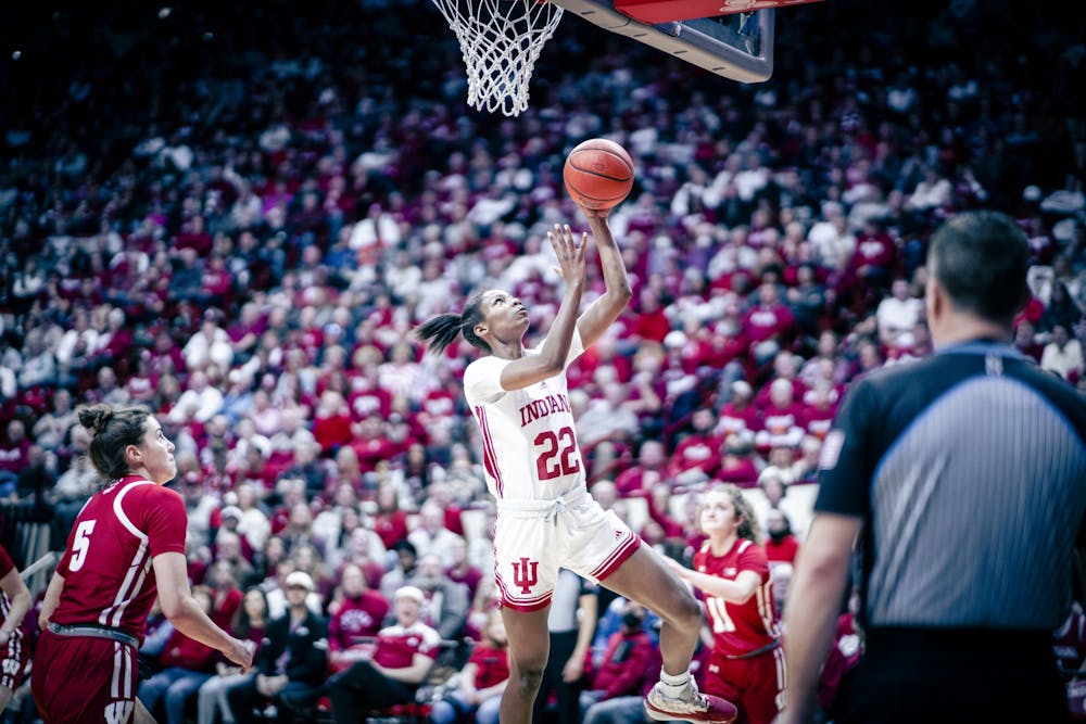 <p>Junior guard Chloe Moore-McNeil takes a layup Jan. 15, 2023 at Simon Skjodt Assembly Hall in Bloomington. The Hoosiers defeated Michigan 92-83 Monday night.</p>