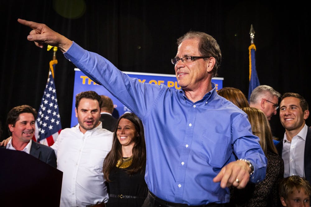 <p>Sen. Mike Braun celebrates his win in the Senate race Nov. 6, 2019, at the JW Marriott in Indianapolis. Braun walked back his statement saying interracial marriage ruling should have been a state decision Tuesday in a release.</p>