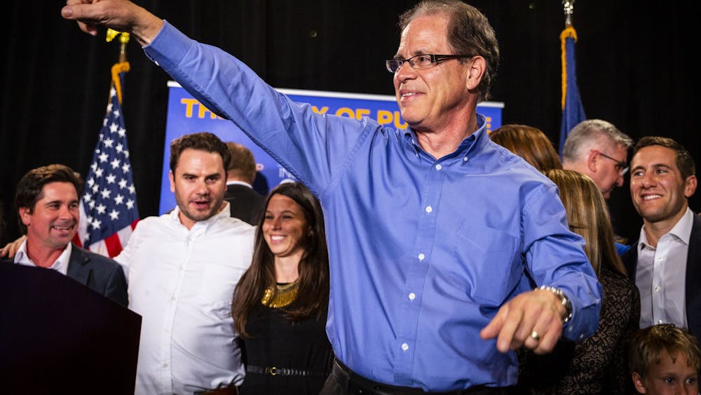 Sen. Mike Braun celebrates his win in the Senate race Nov. 6, 2019, at the JW Marriott in Indianapolis. Braun walked back his statement saying interracial marriage ruling should have been a state decision Tuesday in a release.