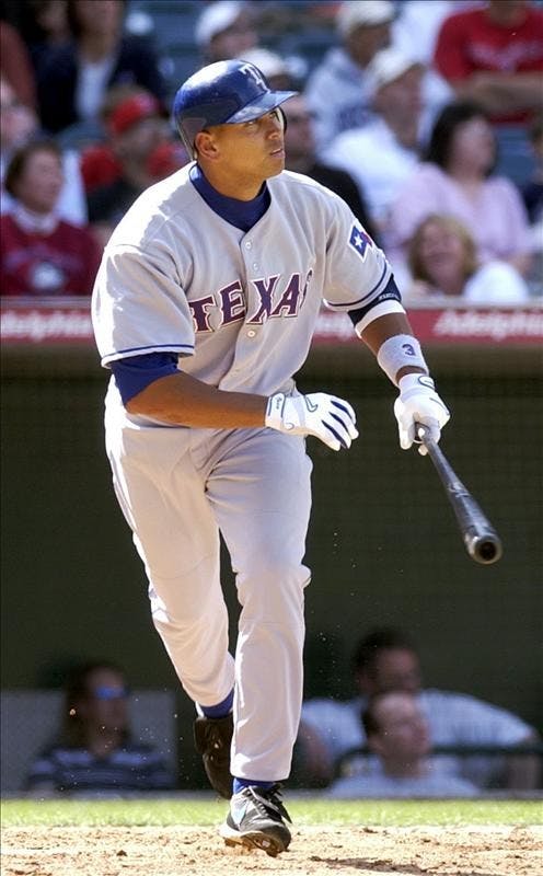 In this April 2, 2003 file photo, Texas Rangers' Alex Rodriguez heads for first base after hitting his 300th career home run in the fifth inning against the Anaheim Angels at Edison Field in Anaheim, Calif. Sports Illustrated reported Saturday that Alex Rodriguez tested positive for steroids in 2003. Rodriguez declined to discuss the tests when approached by SI on Thursday at a Miami gym. 