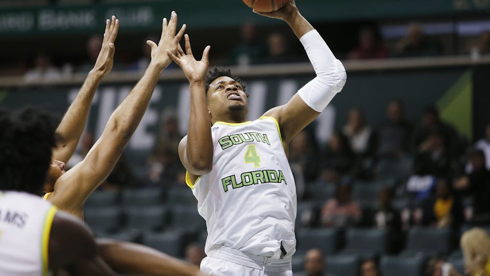 University of South Florida basketball player Michael Durr shoots the ball Jan. 21, 2020. Durr is transferring to IU for his senior season. 