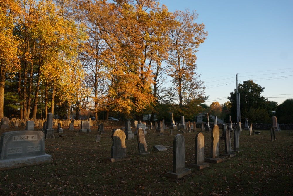 The sun sets on a fall day at&nbsp;Covenanter Cemetery