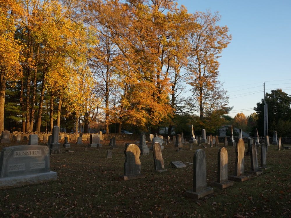 The sun sets on a fall day at&nbsp;Covenanter Cemetery