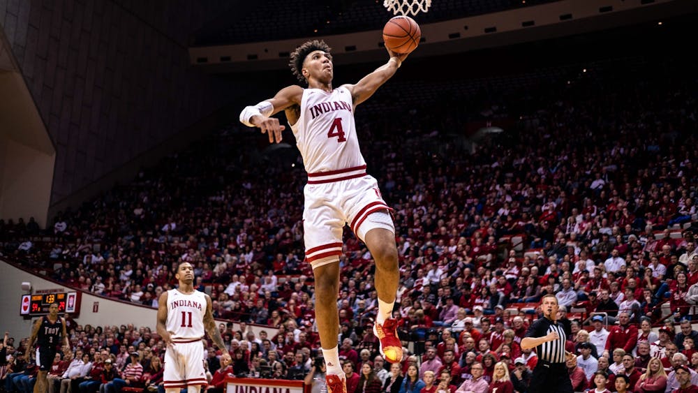 Then-freshman Trayce Jackson-Davis dunks the ball in the second half﻿ Nov. 16, 2019, at Simon Skjodt Assembly Hall. Jackson-Davis announced Friday on Twitter he was staying at IU for his junior season. 