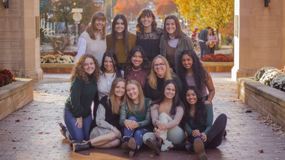 Members of the a cappella group &quot;Ladies First&quot; pose for a photo during the fall of 2021, outside of Sample Gates. &quot;Ladies First&quot; is the only all-female a cappella group on campus. and they will be performing their Fall Show Friday night at 7 p.m. in Jacobs Recital Hall.