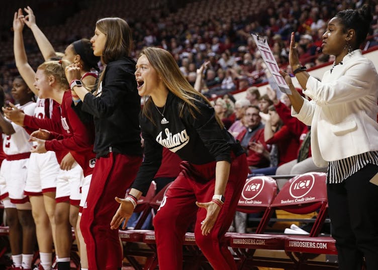 The IU women's basketball team's players, including then-sophomore, now junior, forward Brenna Wise, react to a basket during the Hoosiers' game against the Michigan State Spartans on Dec. 28 at Simon Skjodt Assembly Hall.&nbsp;