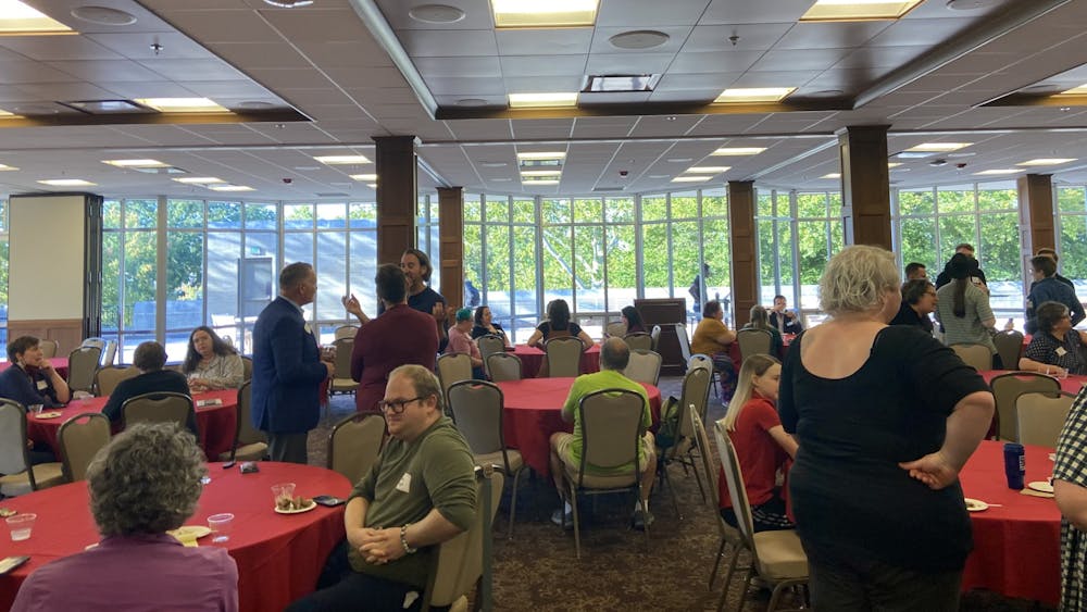Attendees gather for the LGBTQ+ Faculty and Staff Council meeting Sept. 14, 2023 in the Indiana Memorial Union Solarium. The event gave faculty and staff the opportunity to get involved with the new council that aims to serve the LGBTQ+ community on campus.