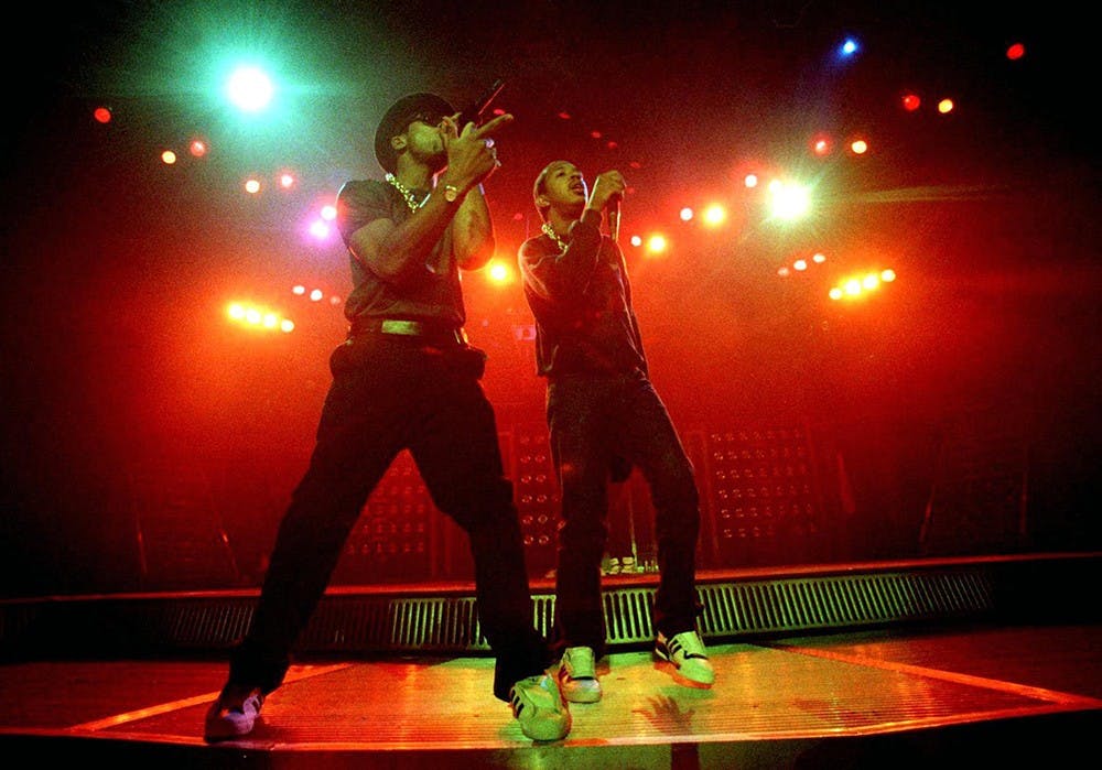 Amid fog and brightly colored lights Darryl 'D.M.C' McDaniels and Joseph 'Run' Simmons perform for a crowd at Reunion Arena in Dallas, Texas. McDaniels will perform a 21-plus show at 10 p.m. on Friday at Kilroy's Dunnkirk.