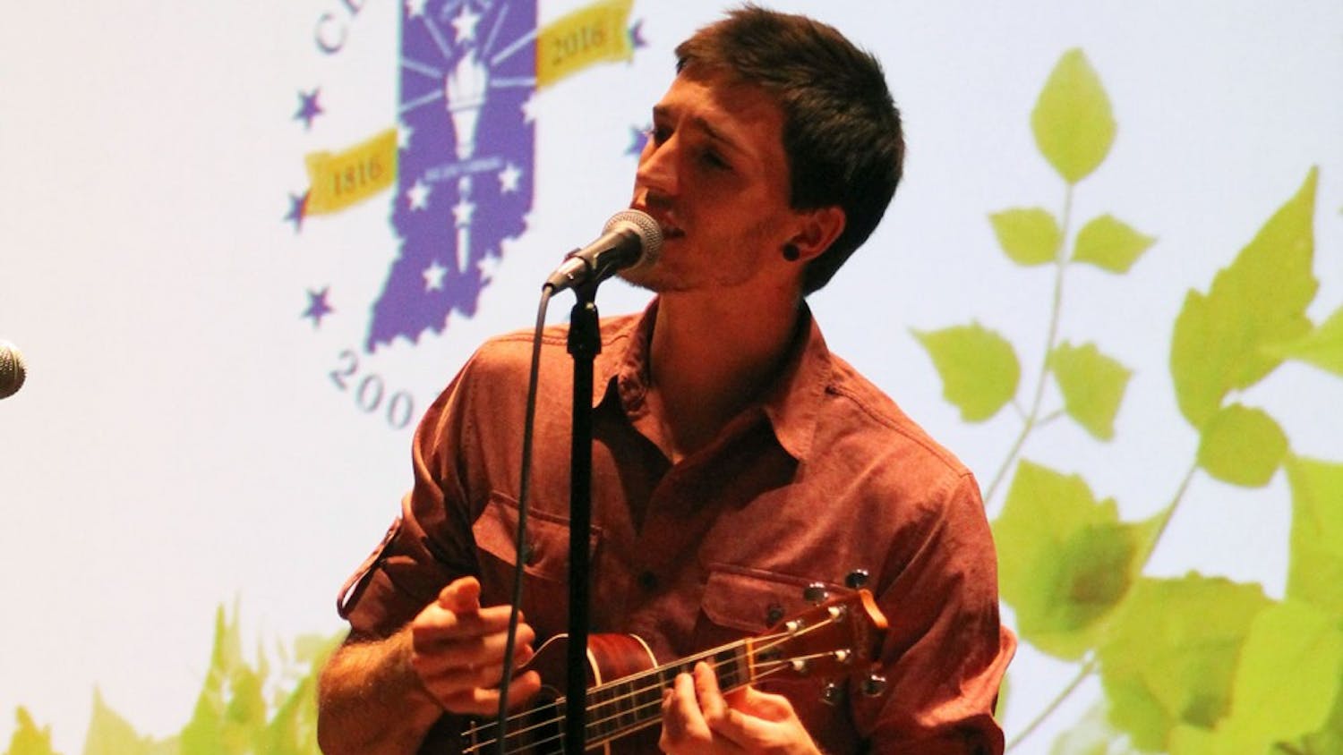 Jake Ryan plays an original song on the ukulele at the Green Light Celebration in Whittenberger Auditorium.