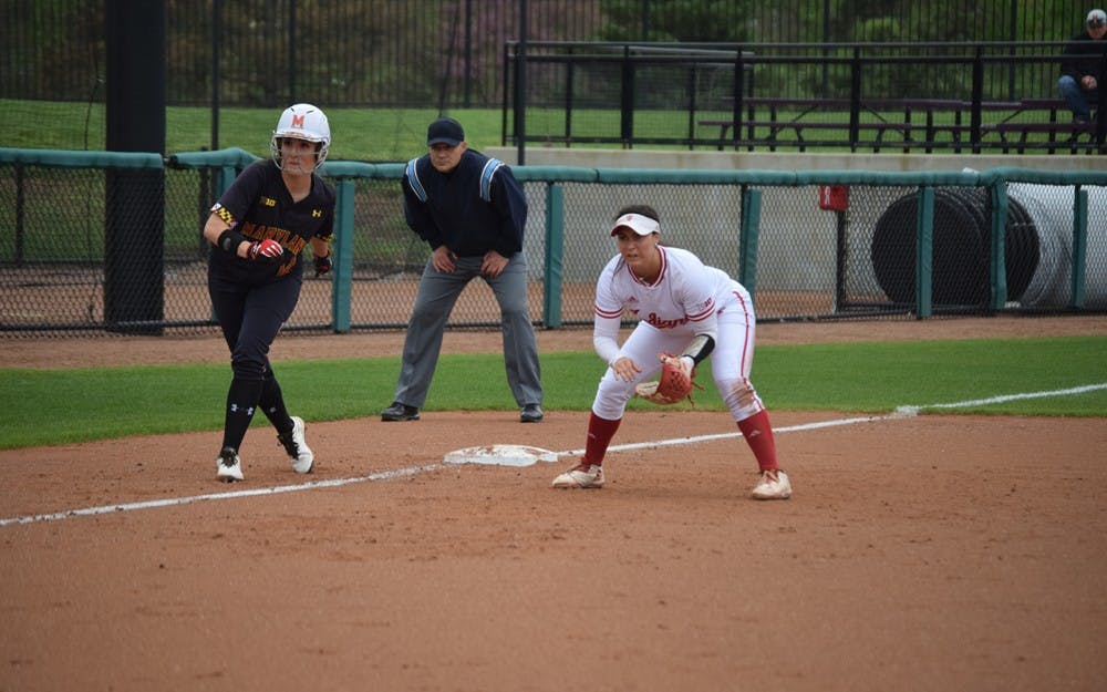 Freshman utility player&nbsp;Katie Lacefield covers the left side of the infield while a Maryland player takes a lead off third base.&nbsp;The Hoosiers defeated the Terrapins in all three games in Bloomington.