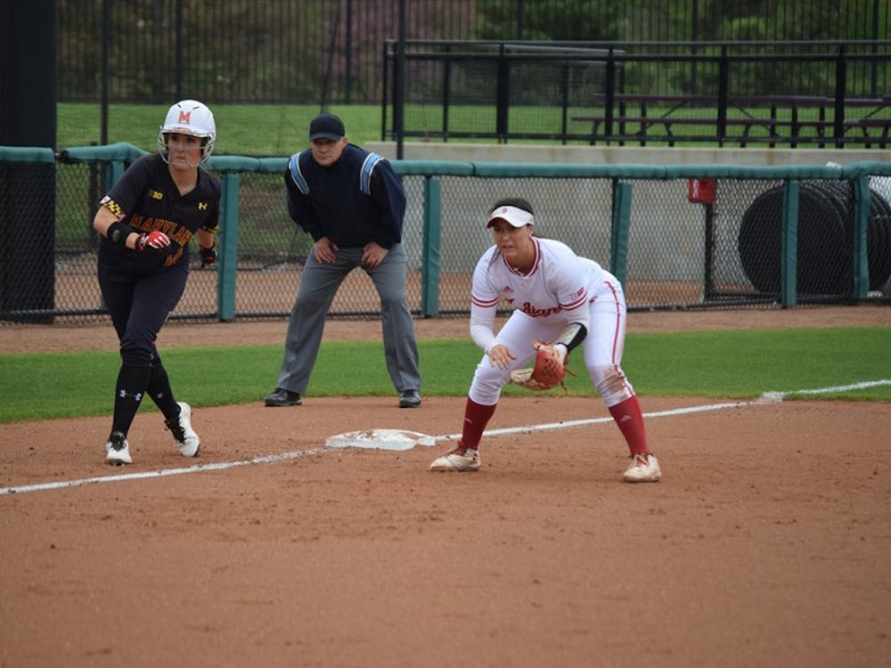 Freshman utility player&nbsp;Katie Lacefield covers the left side of the infield while a Maryland player takes a lead off third base.&nbsp;The Hoosiers defeated the Terrapins in all three games in Bloomington.