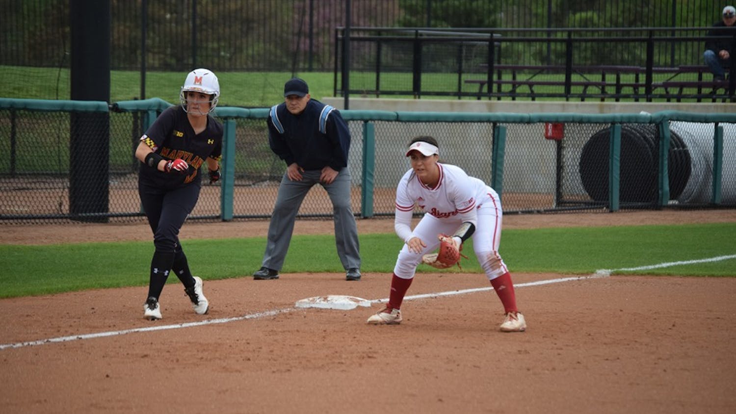 Freshman utility player&nbsp;Katie Lacefield covers the left side of the infield while a Maryland player takes a lead off third base.&nbsp;The Hoosiers defeated the Terrapins in all three games in Bloomington.