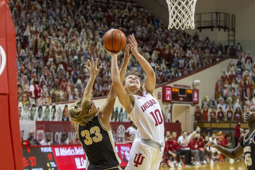 <p>Then-junior forward Aleksa Gulbe attempts a layup March 6, 2021, at Simon Skjodt Assembly Hall. Indiana was outrebounded 52-20 by Michigan with junior forward Mackenzie Holmes out due to a knee injury.</p>