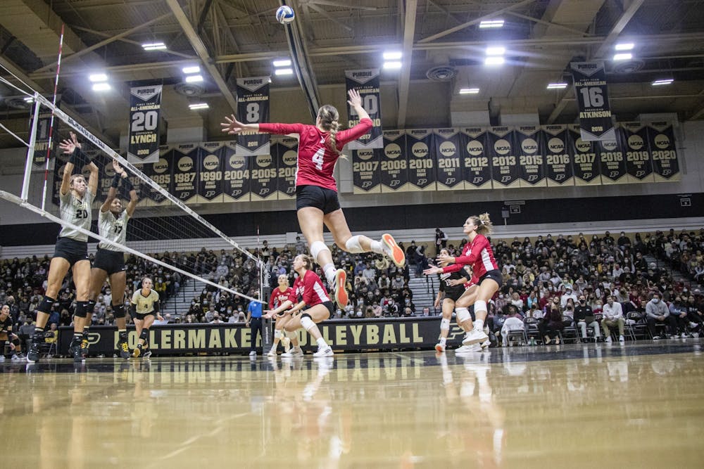 <p>Then-freshman outside hitter Mady Saris goes for a spike against Purdue on Nov. 26, 2021, at Holloway Gymnasium. Indiana lost to No. 4 Nebraska Wednesday night.Classic over the weekend.</p>