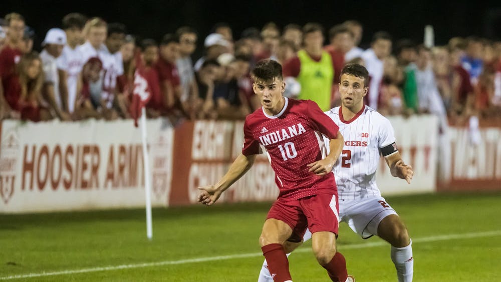 Then-freshman forward Tommy Mihalic passes the ball to a teammate Sept. 17, 2021, at Bill Armstrong Stadium. Mihalic scored the only goal of the match against St. John&#x27;s University, leading to a 1-0 victory for the Hoosiers.