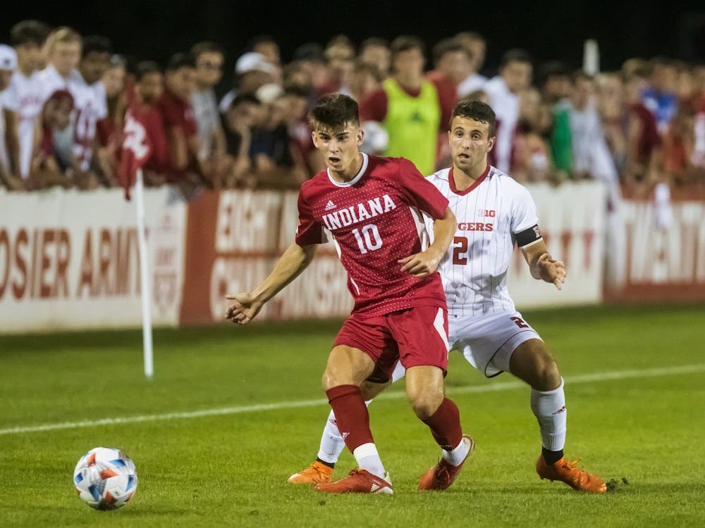 Then-freshman forward Tommy Mihalic passes the ball to a teammate Sept. 17, 2021, at Bill Armstrong Stadium. Mihalic scored the only goal of the match against St. John&#x27;s University, leading to a 1-0 victory for the Hoosiers.