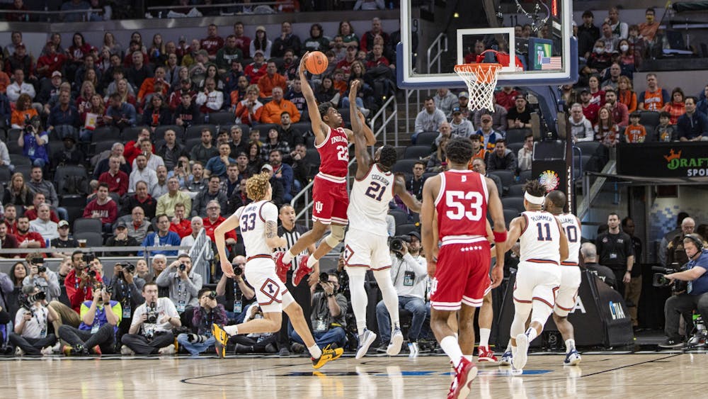 Sophomore forward Jordan Geronimo attempts a dunk during the Big Ten Tournament quarterfinal on March 11, 2022, at Gainbridge Fieldhouse. Indiana beat Illinois 65-63 Friday. 