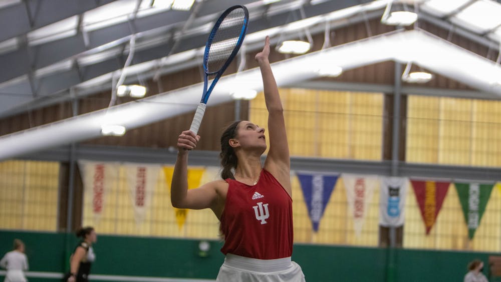 Senior Alexandra Staiculescu prepares to serve Feb. 12, 2022, in the IU Tennis Center. IU defeated Western Michigan 5-0.