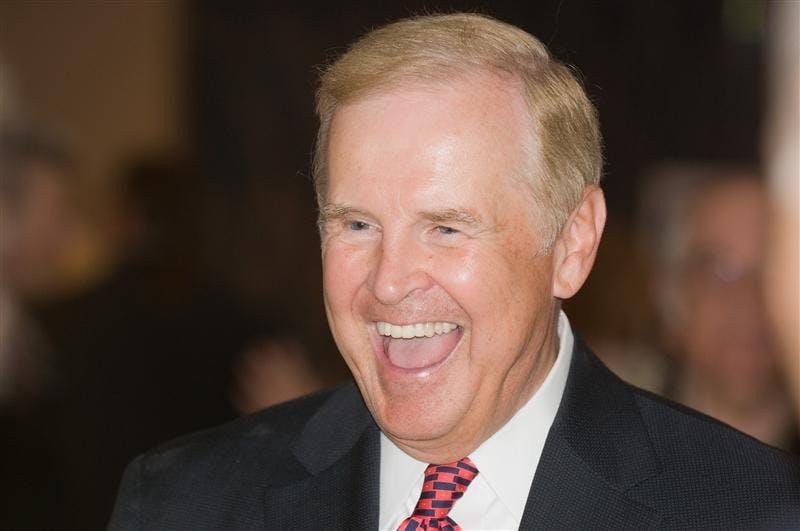 IU Vice President and Chief Administrative Officer Terry Clapacs laughs during his retirement ceremony Thursday in Alumni Hall. The celebration brought to a close his 43-year career at IU.