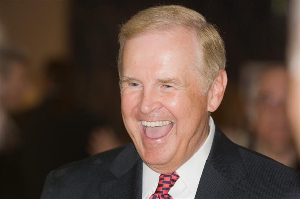 IU Vice President and Chief Administrative Officer Terry Clapacs laughs during his retirement ceremony Thursday in Alumni Hall. The celebration brought to a close his 43-year career at IU.