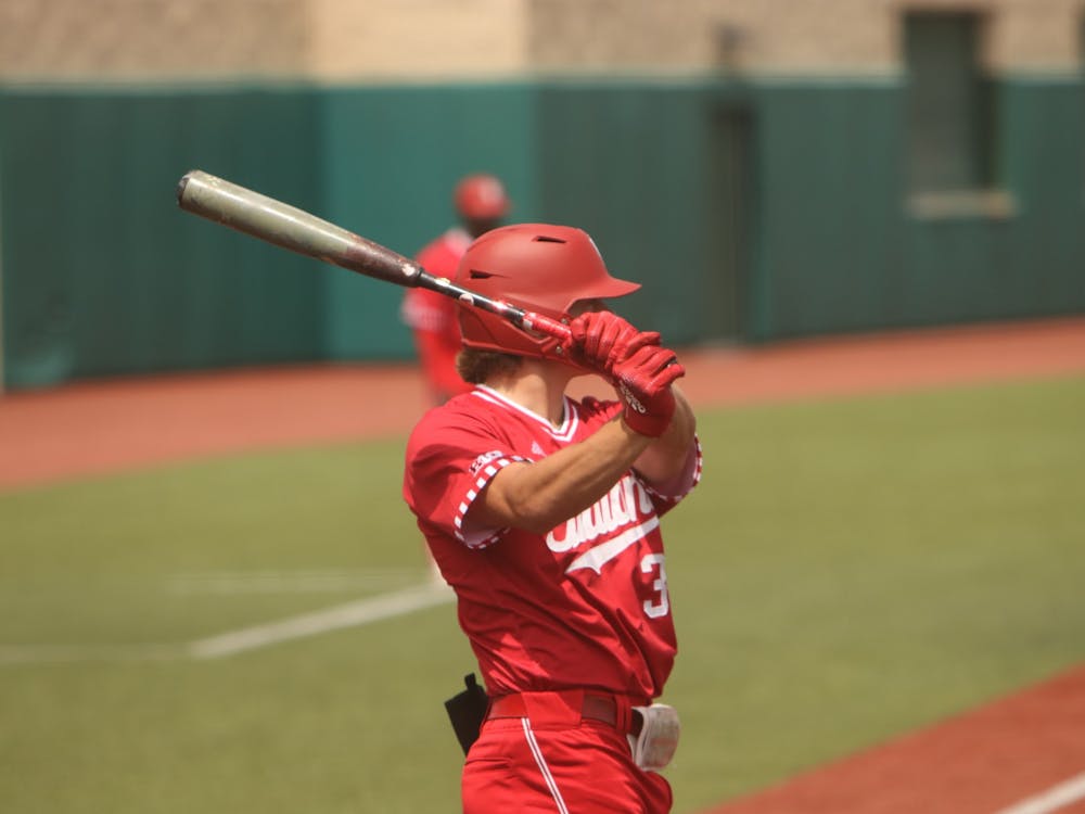 Freshman Carter Mathison takes a practice swing April 24, 2022, at Bart Kaufman Field. IU lost to Rutgers on Tuesday 2-14.&nbsp;