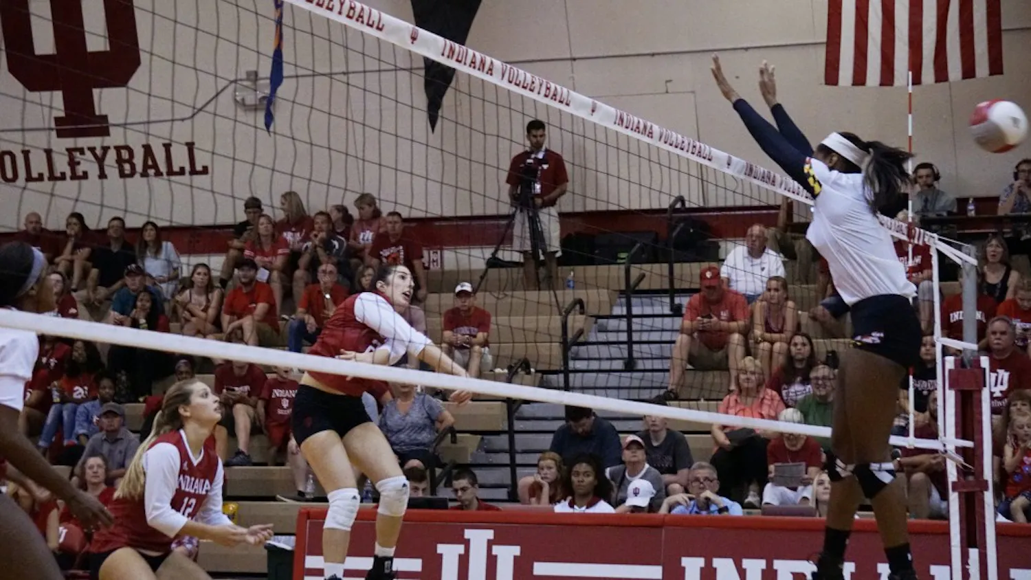 Freshman outside hitter Kamryn Malloy spikes the ball over a Maryland defender for a kill on Sept. 23. IU takes an 0-2 conference record into tonight's match at No. 13 Purdue. 