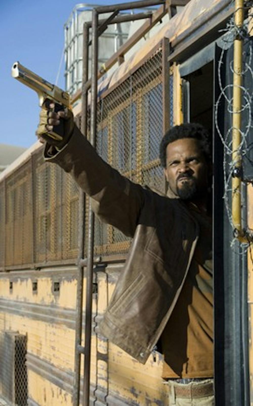 This dude's got all the zombie-hunting essentials; An armored school bus, a big frickin' gun and an "I'm kicking-ass-and-taking-names" look on his face.