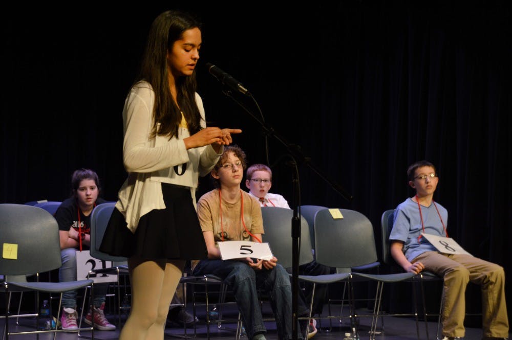 <p>Tara Ganguly, the 2017 IU Bee runner up, spells an early-round word on her hand. The Scripps National Spelling Bee was started in 1925 by the Courier-Journal in Louisville, Kentucky.&nbsp;</p>
