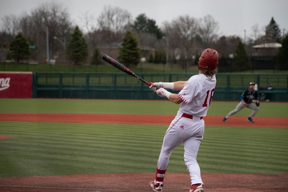 <p>Junior centerfielder Bobby Whalen hits the ball March 21, 2023, against Indiana State University at Bart Kaufman Field in Bloomington. Indiana beat Ohio State 14-6 on Saturday.</p>