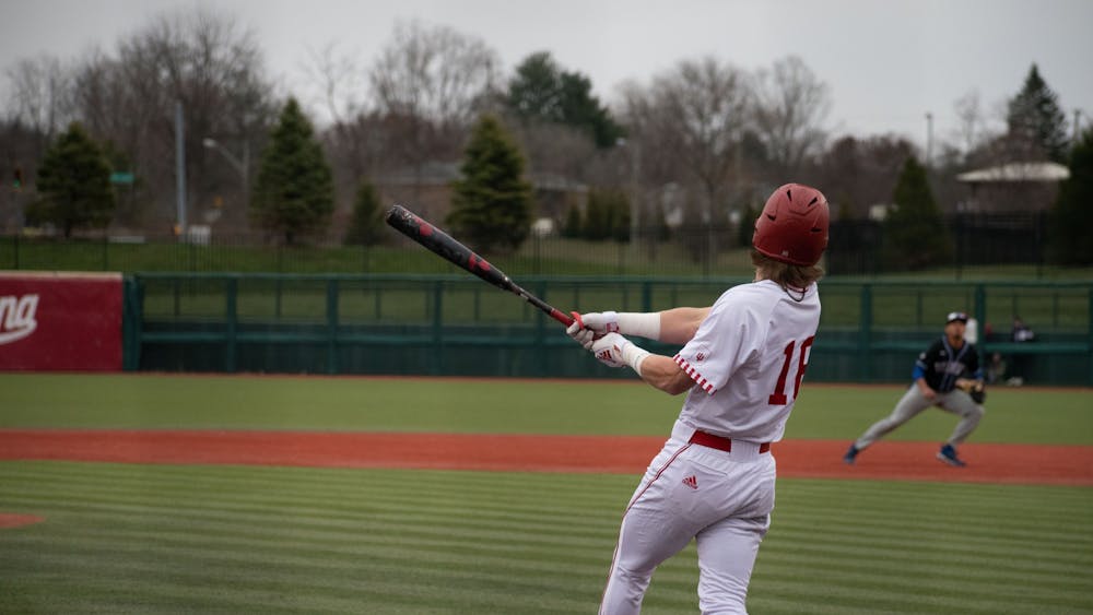 Junior centerfielder Bobby Whalen hits the ball March 21, 2023, against Indiana State University at Bart Kaufman Field in Bloomington. Indiana beat Ohio State 14-6 on Saturday.