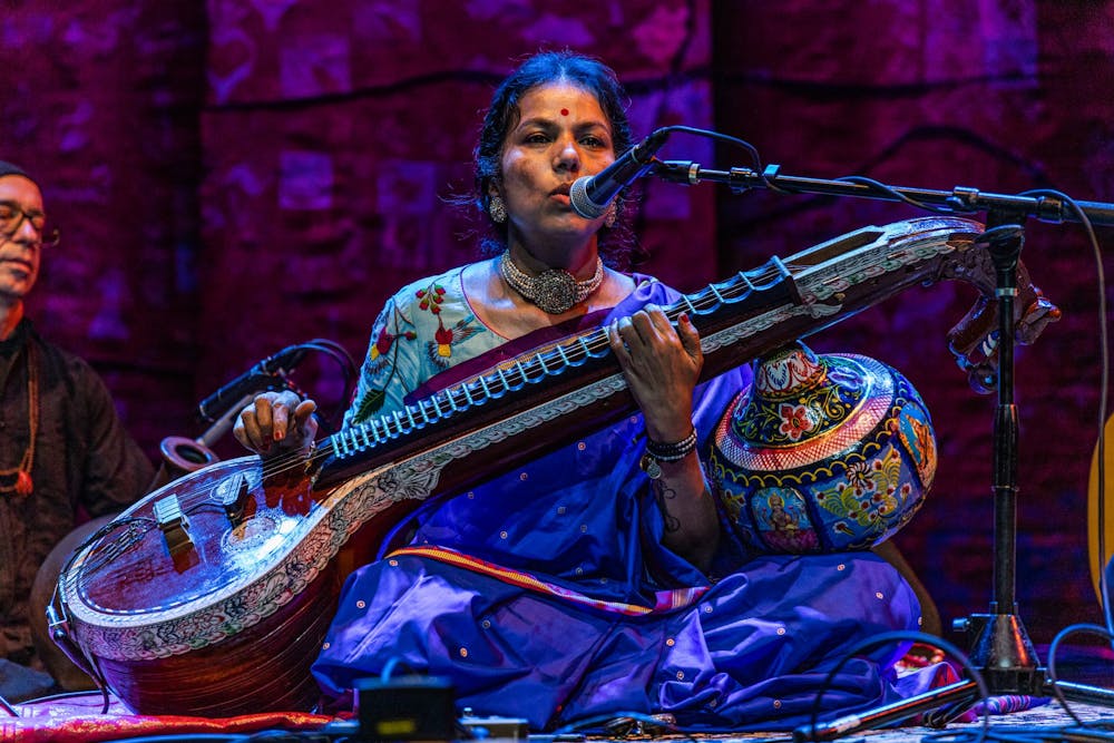 Saraswathi Ranganathan leads the audience through a meditation exercise Sept. 25, 2021, on the stage of the Buskirk-Chumley Theater. The performance was part of the 28th annual Lotus World Music and Arts Festival.
