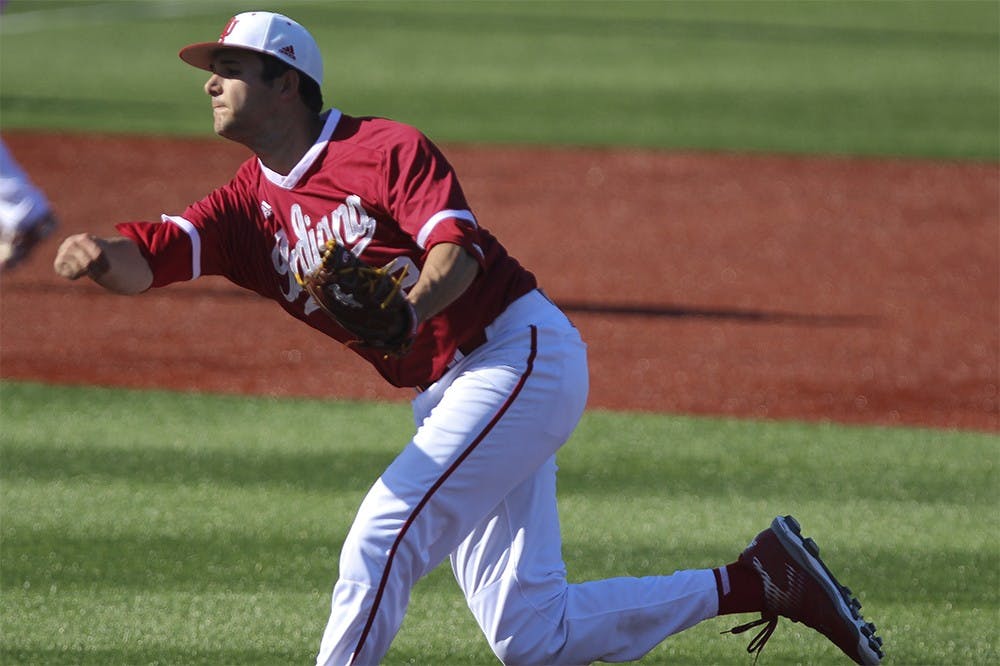 Right-handed pitcher Thomas Belcher throws a pitch during the seventh inning of play against Iowa on Sunday afternoon at Bart Kaufman stadium.