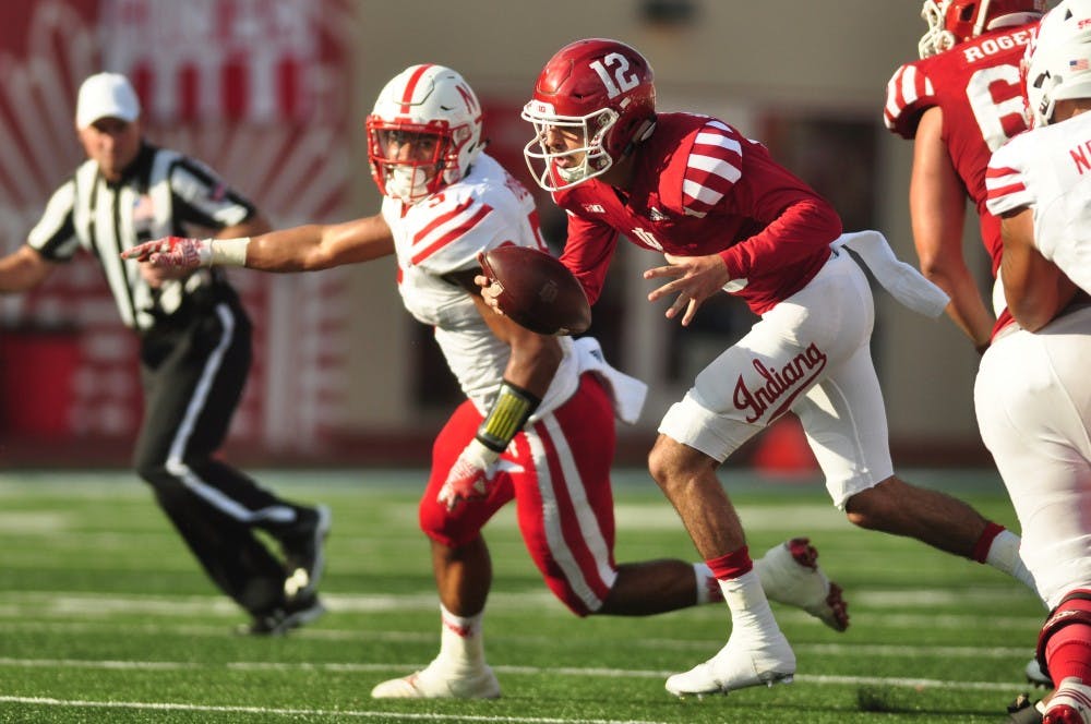 Junior quarterback Zander Diamont sprints through the Nebraska defense at Memorial Stadium on Saturday.