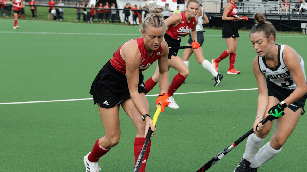 Then-sophomore midfielder Anna Gwiazdzinski runs with the ball during a match against Michigan State on Oct. 15, 2021, at the IU Field Hockey Complex. Indiana field hockey looks to earn its first Big Ten win of the season this weekend against Penn State.