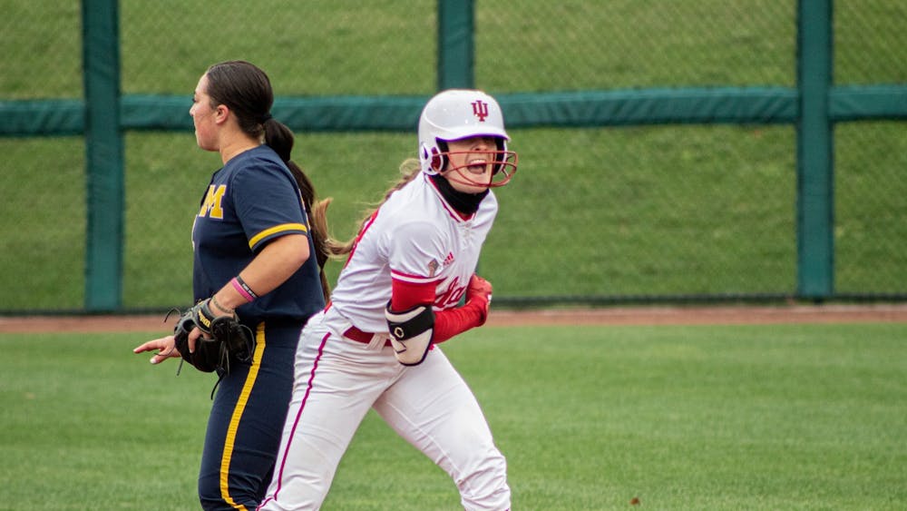 Then-senior outfielder Gabbi Jenkins celebrates getting on base against Michigan on March 26, 2021, at Andy Mohr Field. Indiana will play its first at-home Big Ten series this weekend against Rutgers