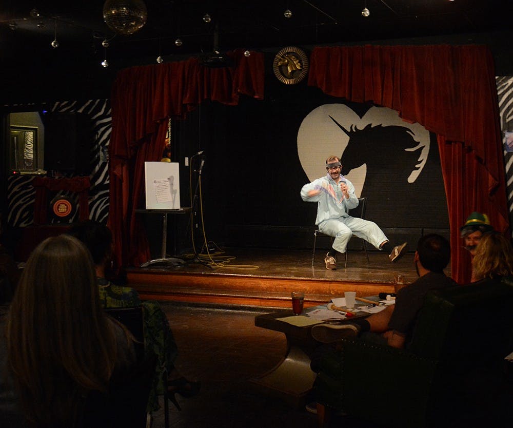 Chance Ledance performs a chair dance during a talent show at the Back Door Bar on Wednesday night. Ledance said he came to the Back Door to perform because he wants to take a part of a fantastic showcase.