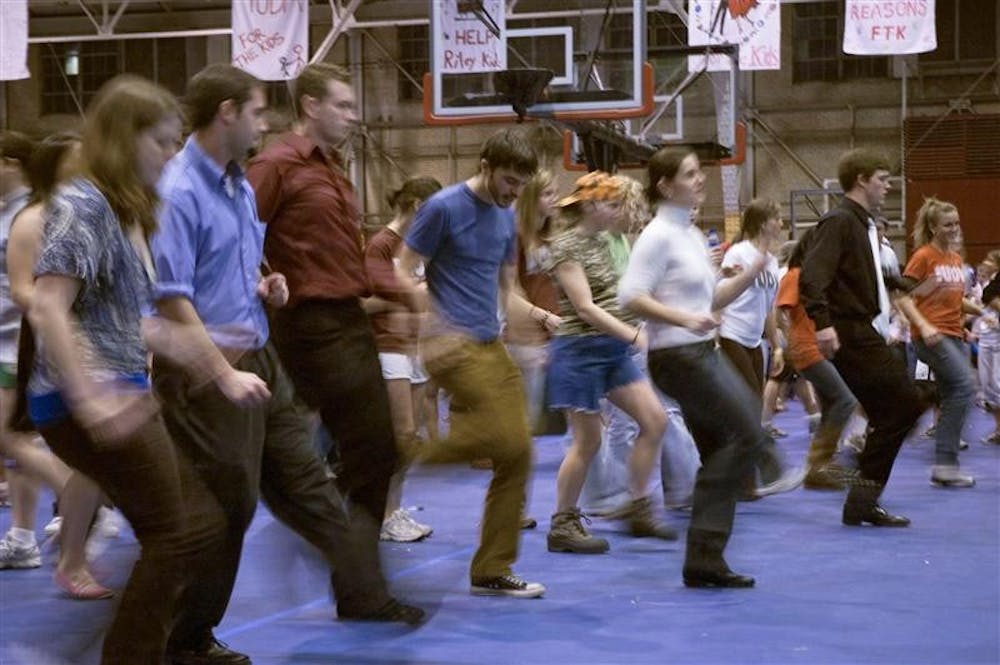 Students learn how to swing dance during the Dance Marathon early Saturday, Nov. 10, 2007 at the HPER.