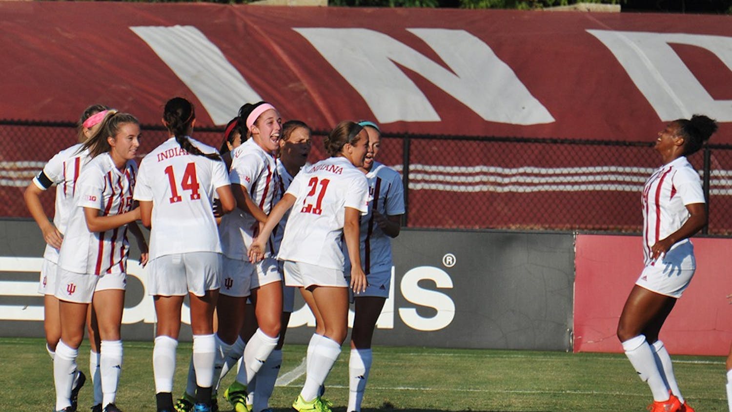 The IU women's soccer team celebrate an early goal in their season-opening game against Louisville on Sept. 24 at Bill Armstrong Stadium.