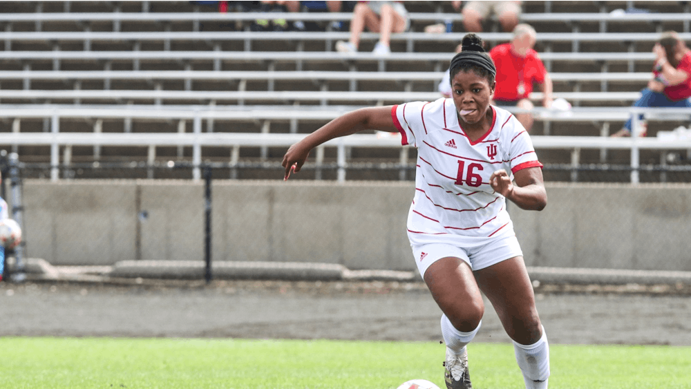 Junior midfielder Bria Telemaque goes to kick the ball Oct. 3, 2021, in Bill Armstrong Stadium against Michigan. Indiana women's soccer will play Northwestern at 8 p.m. Friday in Evanston, Illinois. 