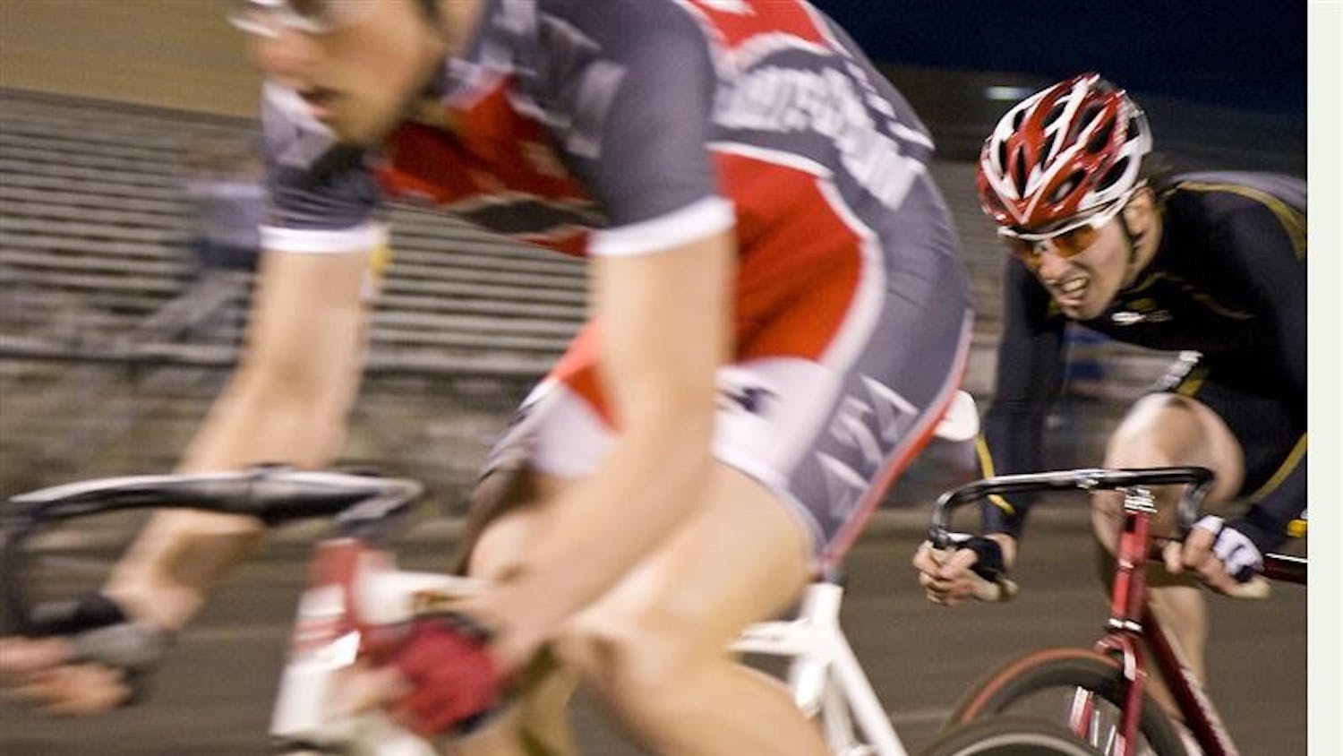 Eric Young of the Cutters, right, passes Matt Neibler of Delta Tau Delta during Individual Time Trials on Wednesday. Young, with a time of 2:18.25, had the fastest time of the evening.