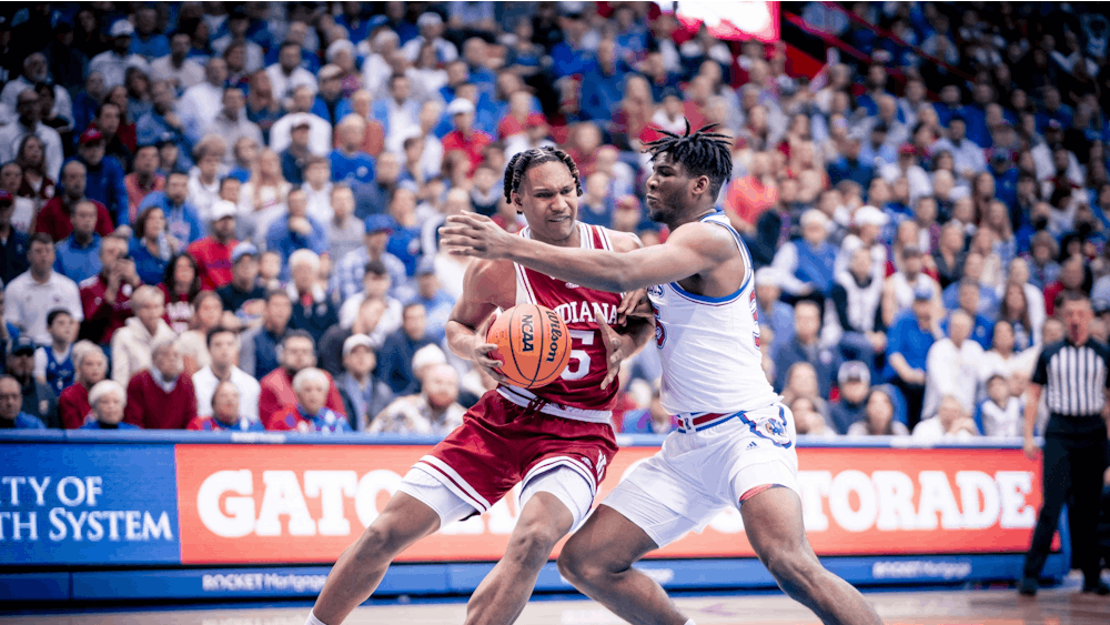 Freshman forward Malik Reneau drives to the basket Dec. 10, 2022, at the Allen Fieldhouse in Lawrence, Kansas. The Hoosiers played Penn State at Bryce Jordan Center on Jan. 11, 2023.