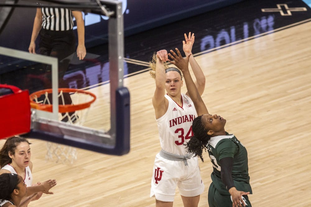 Junior guard Grace Berger attempts a shot Thursday in the quarterfinals of the Big Ten women's basketball tournament at Bankers Life Fieldhouse in Indianapolis. No. 2 seed IU led No. 7 seed Michigan State at halftime 34-26.