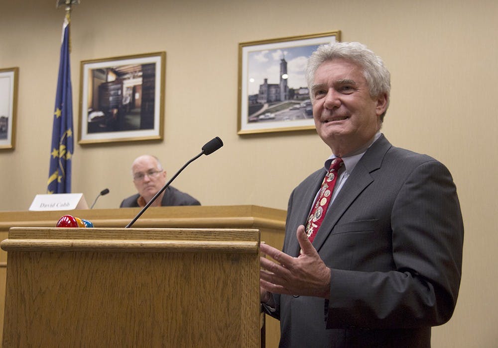 Professor Paul Helmke, representative of the IU Civic Leaders, introduces the audience to James Bopp, a “Citizens United” lawyer and David Cobb of the Move to Amend campaign, during their debate over the Supreme Court case Citizens United v. FEC Monday at the Maurer School of LawMoot Court Room.