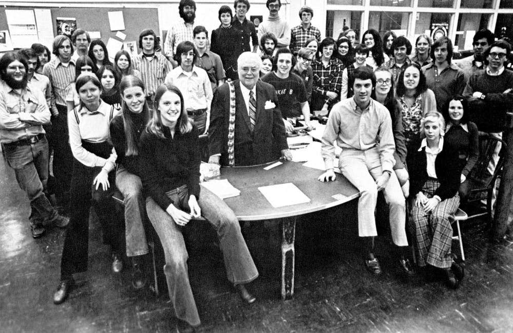 <p>Paul Tash, a former editor-in-chief of the Indiana Daily Student, poses in a photo with Herman B Wells and the 1974 staff of the IDS. Tash will give the 2018 undergraduate commencement address May 5.</p>
