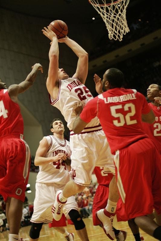 Freshman forward Tom Pritchard pulls up for a jump shot on his way to the basket during the first half of the Hoosiers game against Ohio State afternoon at Assembly Hall.