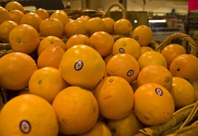 Baskets of Oranges sit on display at the Kroger Shopping Center on College Mall Rd. Oranges provide a source of vitamin C.